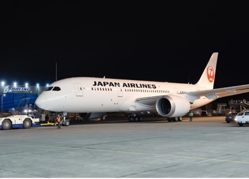 JAL's first Boeing 787 rolls out of the paint hangar in new livery. Photo by Boeing.
