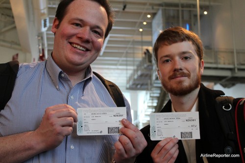 Me and Jeremy Dwyer-Lindgren (with NYC Aviation) show off our boarding passes before getting on board at Paine Field.