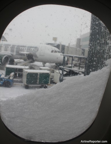 Before we left the gate at DIA the whole window ended up being blocked with snow. Kind of cool and kind of lame.