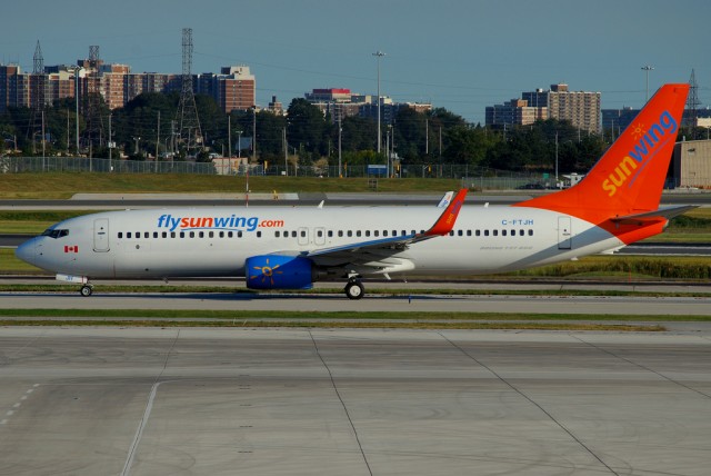 The REAL Sunwing livery on a Boeing 737-800 in Toronto. 