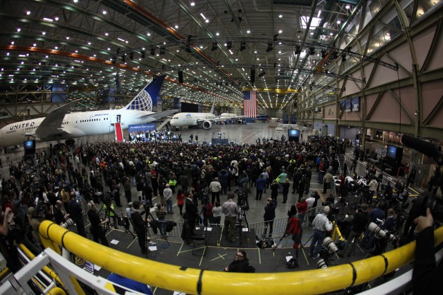 People wait to hear Obama speak inside the Boeing Factory. United's 787 showed off their livery. Photo by Jeremy Dwyer-Lindgren.