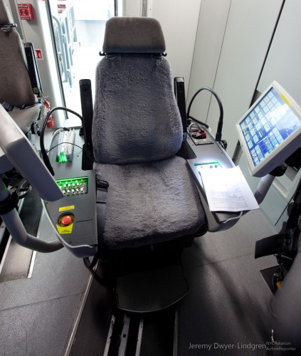 The flight instructor's chair inside the Dreamliner flight sim. Photo by Jeremy Dwyer-Lindgren / NYCAviation.com.