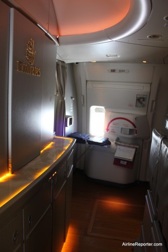 Talk about class. This photo shows the first class enterance on one of Emirates Boeing 777-200LRs. Check out those wood floors. CLICK FOR LARGER.
