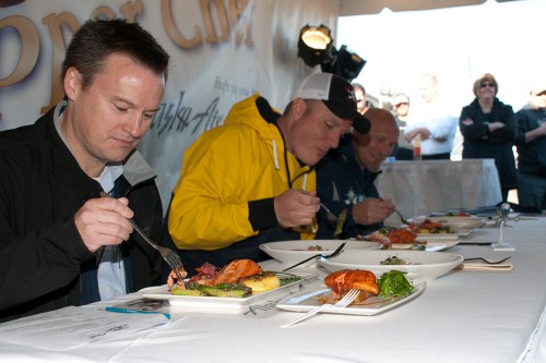 Judges try the different salmon dishes.