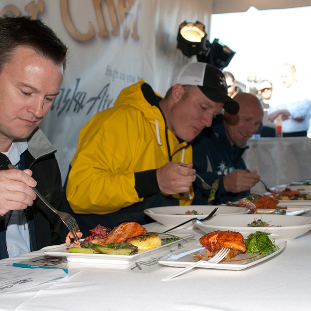 Judges try the different salmon dishes.