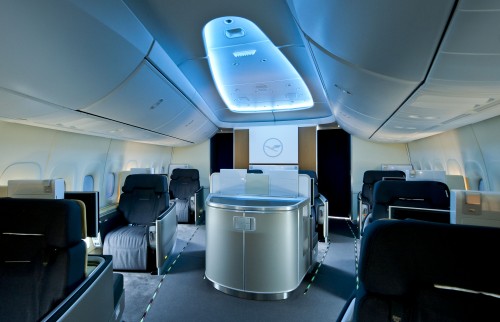 The First Class section in the nose of the Boeing 747-8I for Lufthansa. Click for larger. Photo by Boeing.