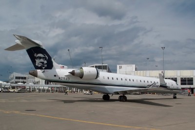 Alaska Airlines Bombardier CRJ-700 (N215AG) operated by Skywest seen at SEA. 