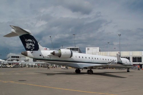 Alaska Airlines Bombardier CRJ-700 (N215AG) operated by Skywest seen at SEA.