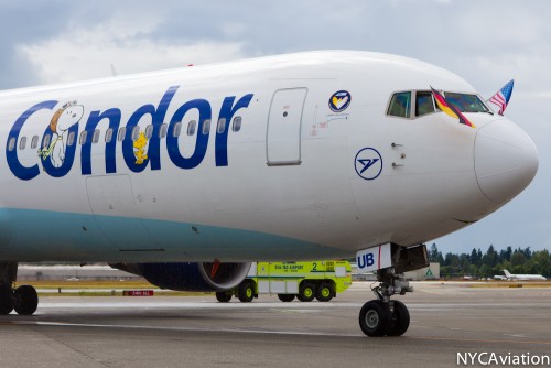 Condor's Boeing 767-300ER (D-ABUB) arrives in Seattle with flags waving.