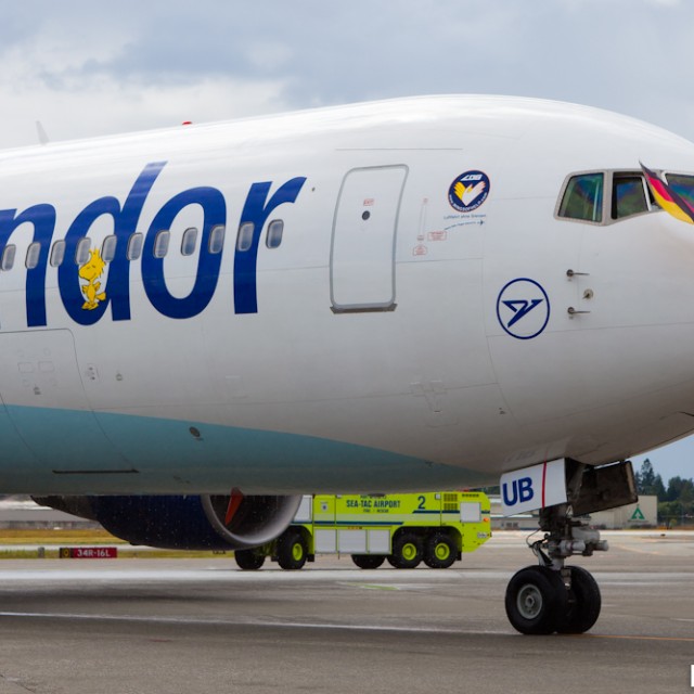 Condor's Boeing 767-300ER (D-ABUB) arrives in Seattle with flags waving.