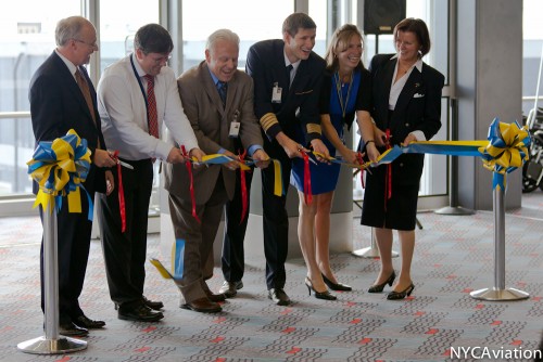 Ribbon cutting ceremony inside the terminal.