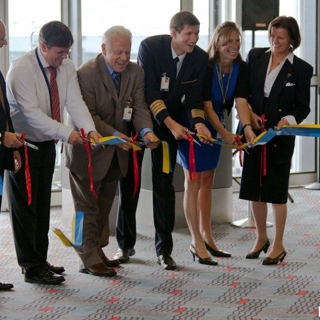 Ribbon cutting ceremony inside the terminal.