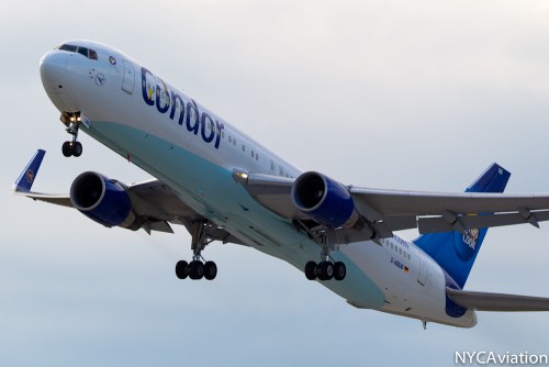 The blue-bellied aircraft lifts off from Seattle.