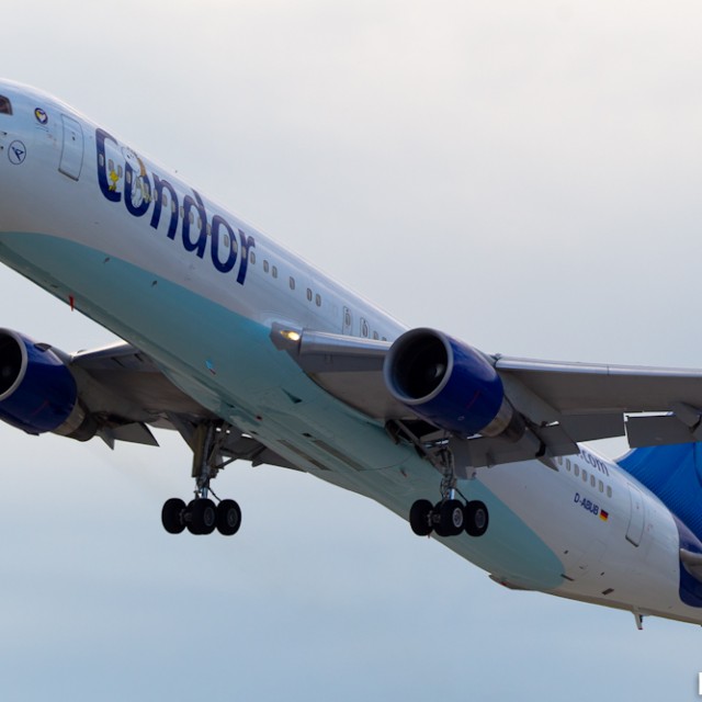 The blue-bellied aircraft lifts off from Seattle.