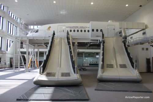 The slides are not for fun. This hybrid of Boeing 777 and Airbus A380 is to teach cabin crew how to evacuate an airplane.