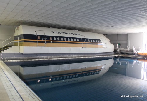 The water is calm in this photo, but during training, instructors can make waves in the Singapore Airlines training pool.