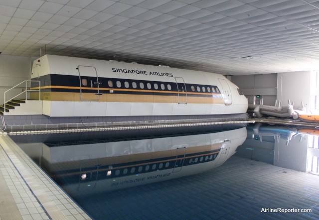 The water is calm in this photo, but during training, instructors can make waves in the Singapore Airlines training pool. 