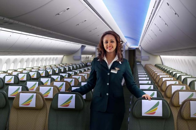 787_06_L A flight attendant in the 787's economy class. Image from Ethiopian Airlines.