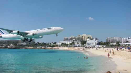Terry Kraabel took this photo of an Air France jet landing at the Saint Marteen airport in the Caribbean. This beach is just shy of the airport, making it appear as though the plane is about to land on it. Kraabel took the photo from an airport restaurant.