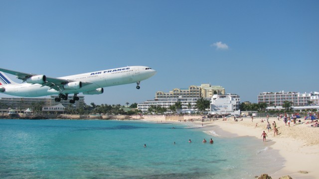 Terry Kraabel took this photo of an Air France jet landing at the Saint Marteen airport in the Caribbean. This beach is just shy of the airport, making it appear as though the plane is about to land on it. Kraabel took the photo from an airport restaurant.