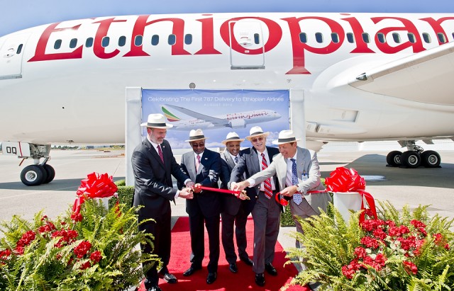 You cannot have a delivery ceremony without a ribbon cutting. Image from Boeing. 