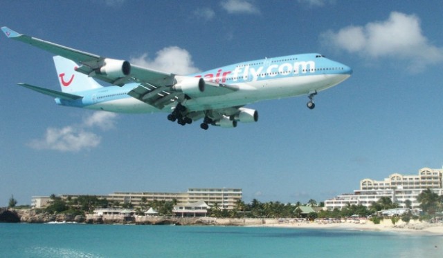 A Corsair Boeing 747-400 lands at St. Maarten. Image by Chris Sloan / Airchive.com.