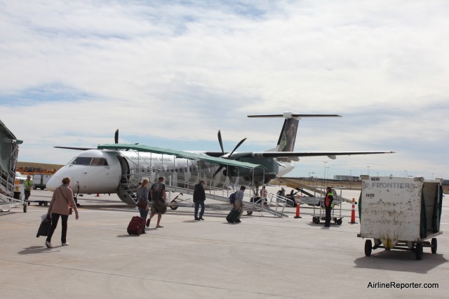 Frontier Bombarider Q400 (N502LX) sits at Denver, waiting to take me to Aspen.