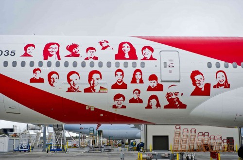 HI-RES IMAGE (click for larger): Air China"s newest 777-300ER features the faces of people who were selected from a social media campaign co-organized by Air China and Boeing in July 2012. Image from Boeing.