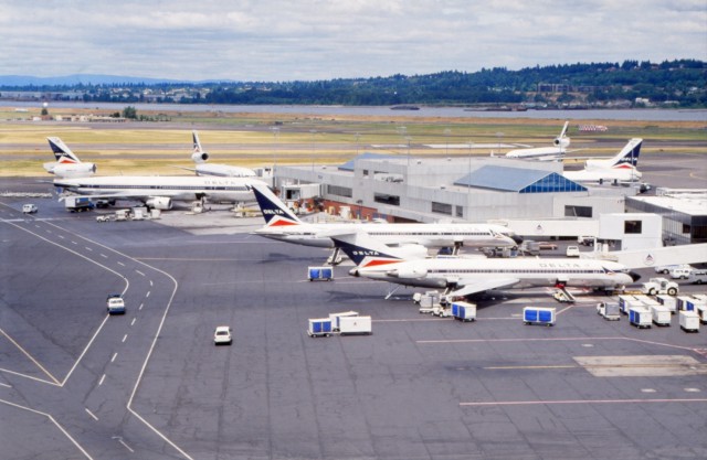 What an amazing shot. Three different tri-holers: L1011, MD-11 and 727 all at PDX in July 1992. Photo by Delta Air Lines.