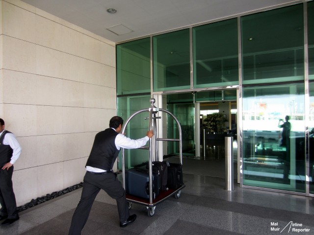 No Need to Carry your own bag, porters do it for you. Photo: Mal Muir - airlinereporter.com