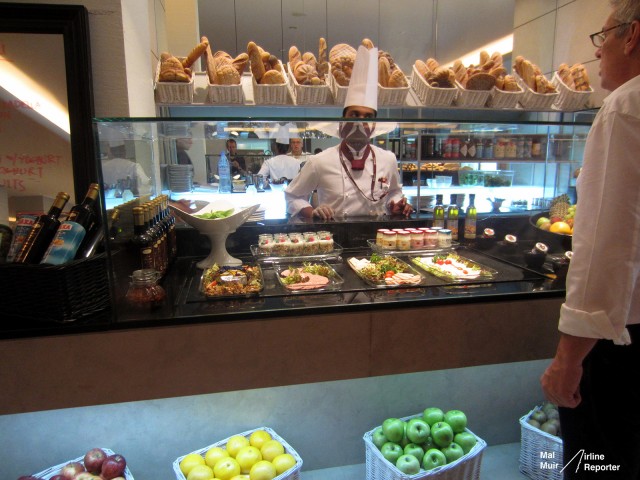 Hungry? One of many food bars in the Qatar Airways Premium Terminal - Photo: Mal Muir - airlinereporter.com