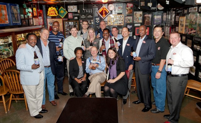 Members of RwandAir, Boeing and Pike Brewing Company celebrate with a toast. Photo from Boeing.