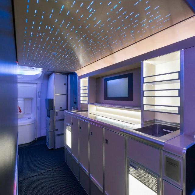 A walk-up bar in the premium cabin stocked with snacks and refreshments will be a first for any U.S. airline and adds another distinctive luxury feature to the 777-300ER. Photo from American Airlines.
