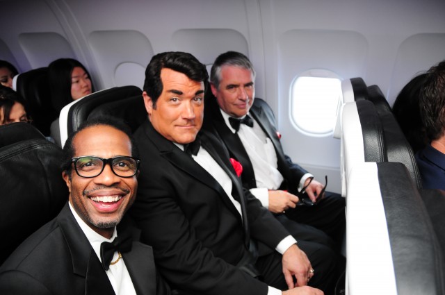 The Rat Pack on board the aircraft (at least people that look like them). 