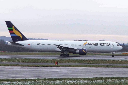 This Eritrean Airlines Boeing 767 obviously has its front door un-latched at the time of landing. Click photo for larger view and check then door handle.