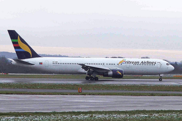 This Eritrean Airlines Boeing 767 obviously has its front door un-latched at the time of landing. Click photo for larger view and check then door handle. 