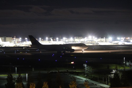 Photo of a Lufthansa Boeing 747-8I taking off from Paine Field taken from my Hilton Garden Inn hotel room. Love the smell of AvFuel in the evening. CLICK FOR LARGER.