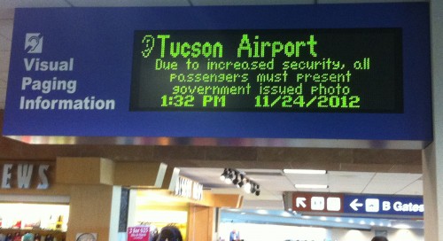 This sign is actually lying. This photos was taken via an iPhone just minutes before getting through security without valid ID.