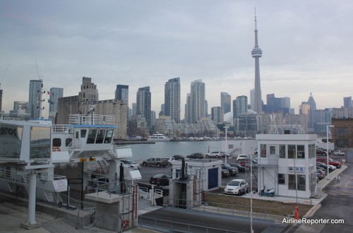 After arriving at Billy Bishop airport, be sure to turn around and catch the view of the ferry with Toronto in the background.