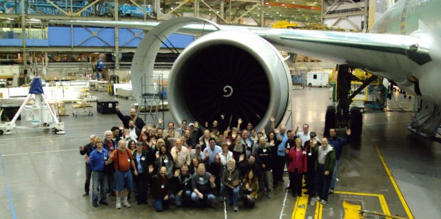 The Aviation Geek Fest 2010 peeps pose in front of a GE90 engine on a Boeing 777. Photo from Boeing.