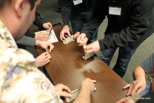 Teams of eight got a lesson in supply line management, while building souvenirs.