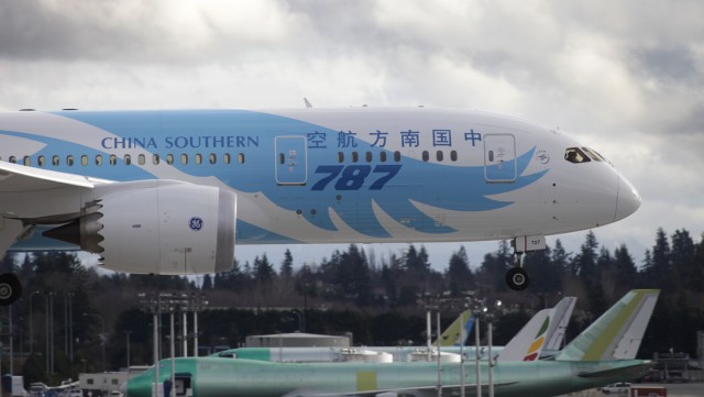 A China Southern Boeing 787 Dreamliner arrives a Paine Field in Everett Thursday. All other Dreamliners are grounded. Boeing was granted premision to fly this aircraft to Everett.