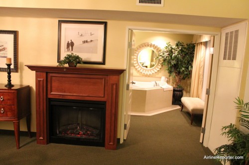 There is a fire place (fake, but still gives the ambiance) in the living room and bedroom. This is looking into one of the two double doors going into the bedroom.