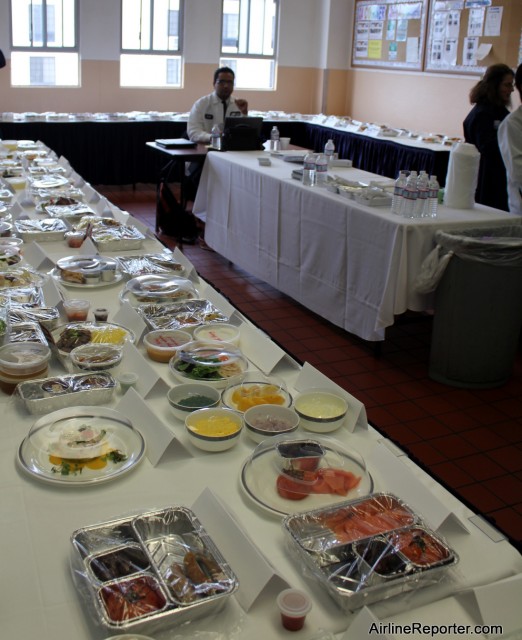 The room has food all around from first, business and economy levels of service. 