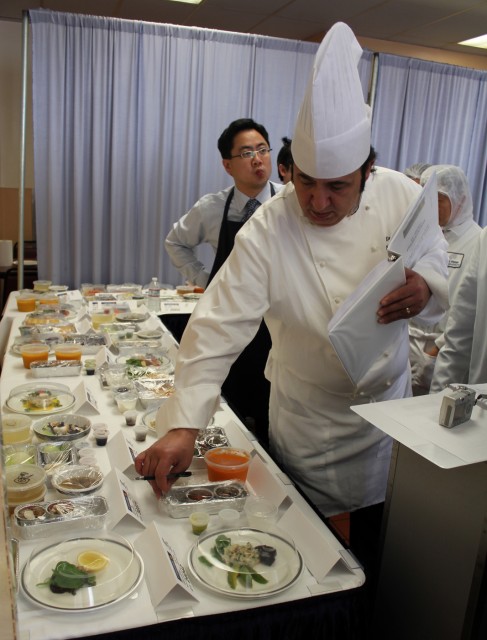 The chef shows off his creations. 