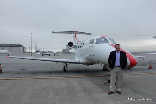 At SFO in front of a JetSuite Embraer Phenom 100.
