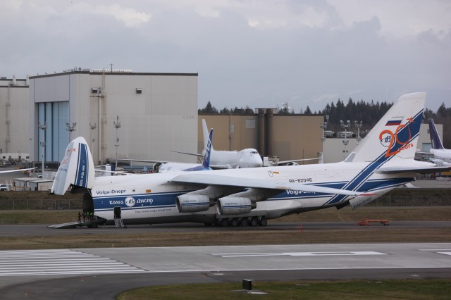 The AN-124 is kneeling with the nose up, ready to unload its cargo. 