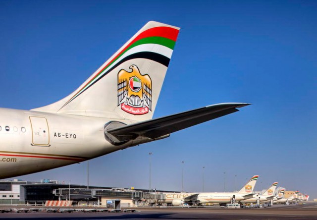 An Etihad Airways Airbus A330-200 tail at Abu Dhabi International Airport (AUH). Image from AUH. 