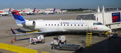 The Delta Connection brand through its subsidiaries and partners such as ASA, the former ComAir, and SkyWest, is one of the worldâ€™s largest CRJ operators. The CRJ200s are being retired quickly and have now been limited to routes of less then 2 hours in duration or 700 miles. This CRJ-200 is seen at the airlineâ€™s home base and hub at Atlanta. Image from Chris Sloan / Airchive.com.