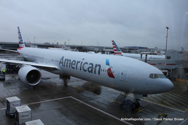 American Airlines Boeing 777-300ER at a cloudy JFK. 